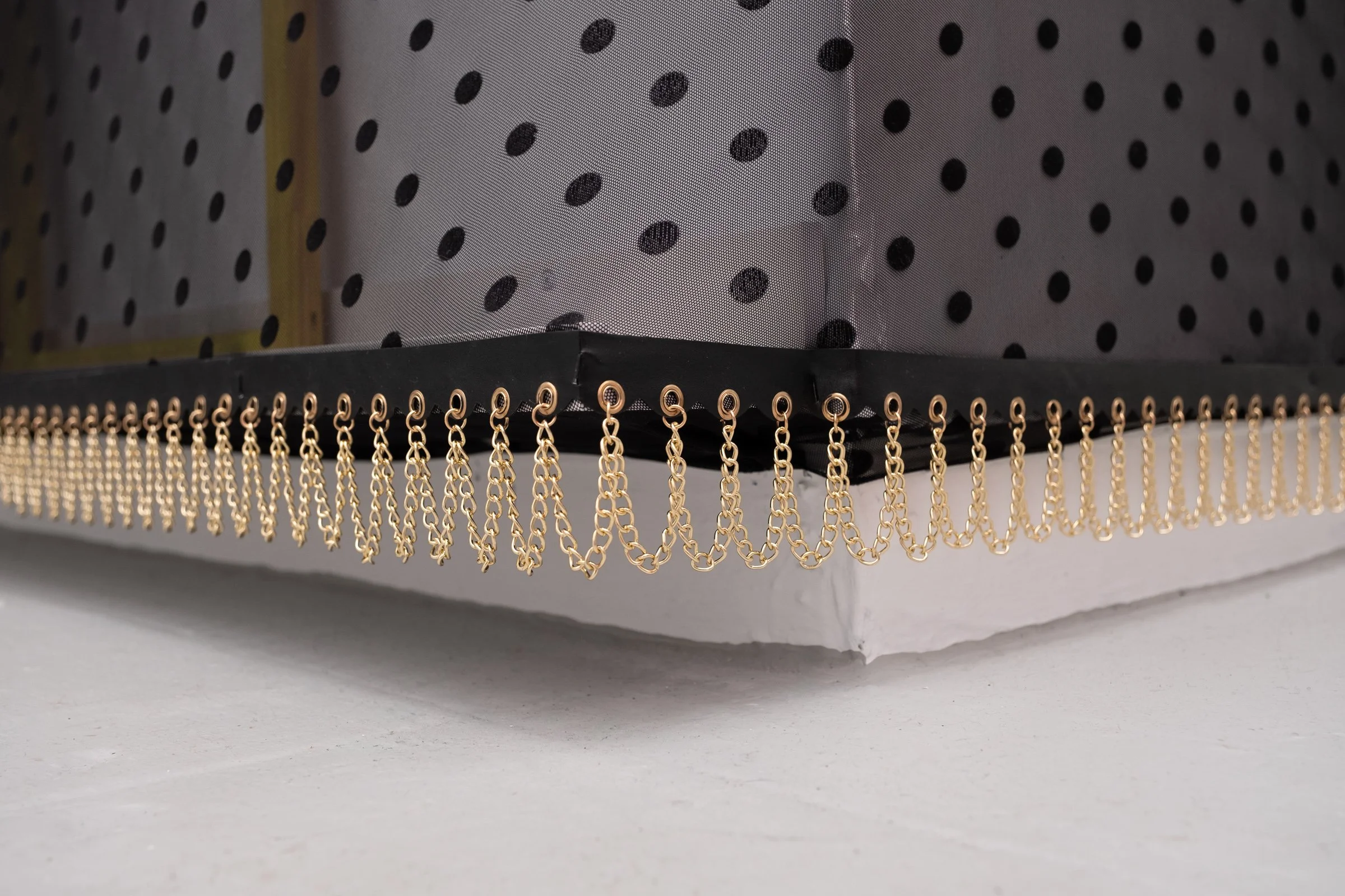   Belle De Jour for Hallway Corner                                         2025. Site-specific installation with spandex mesh, elastic trim, pleather, leather, ceramic, shelves, doorknob                                 152" x 125" x 5" 