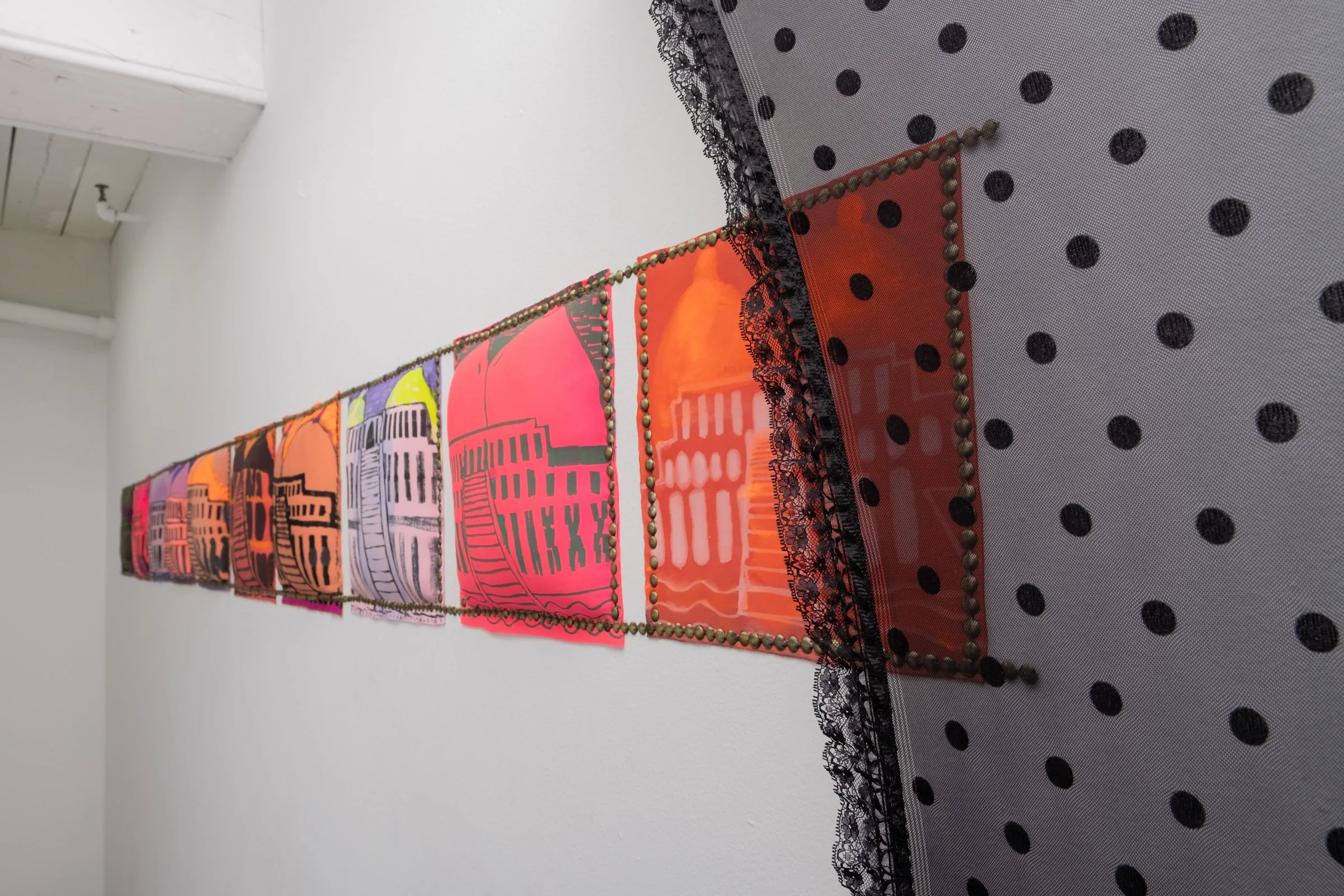   TOPS (For Hatshepsut)                                     2024 - 25. Site-specific installation of permanent marker, fluid acrylic on neoprene drawings, with upholstery tacks and poly-fil. 12" x 12" each; 12.5" x 150" overall 