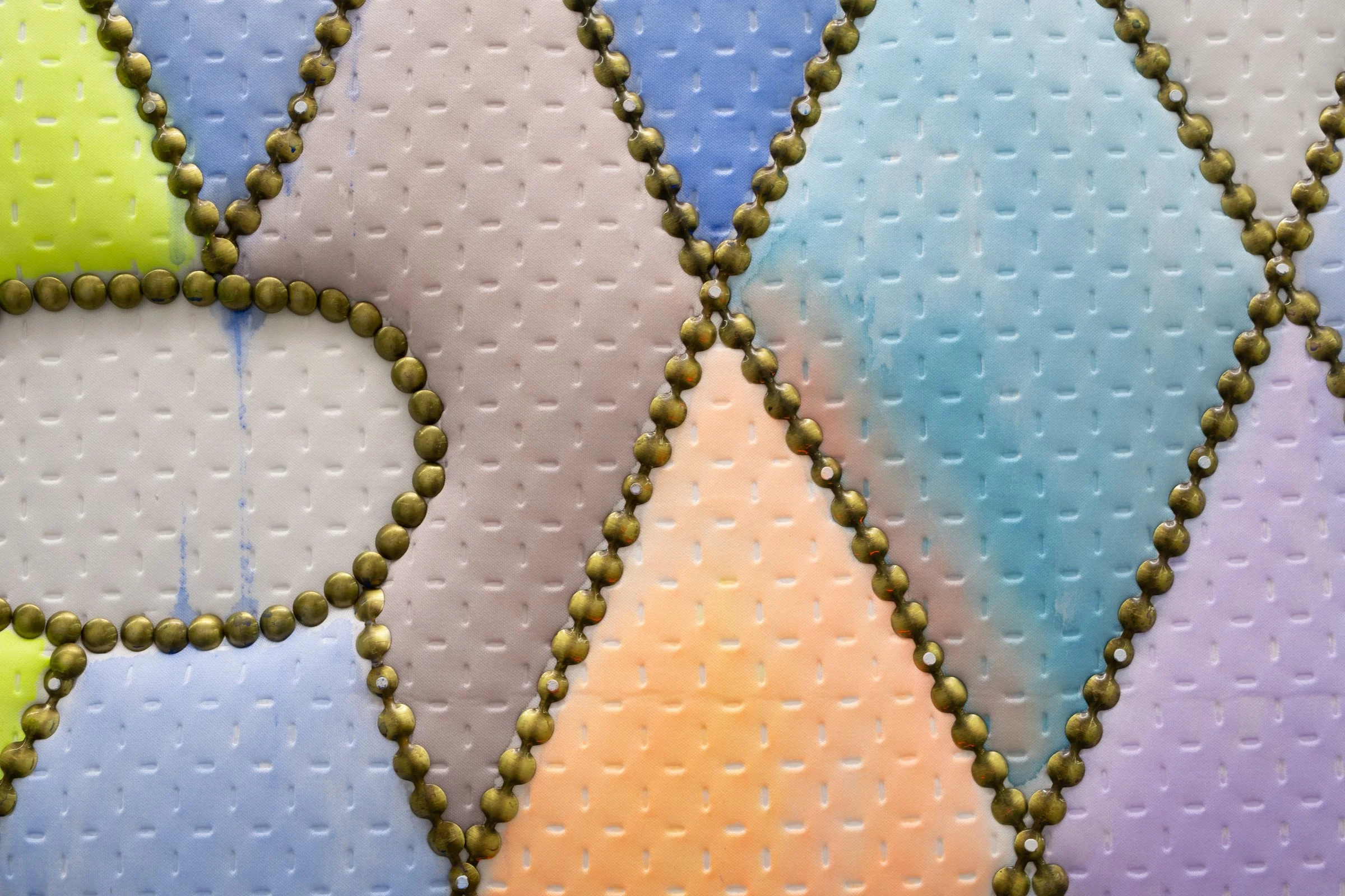   128 (for OyG)                                               2025. Site-specific painting with neoprene, fluid acrylic, batting, upholstery tacks, nails            40.5" x 87.5" x 5" 