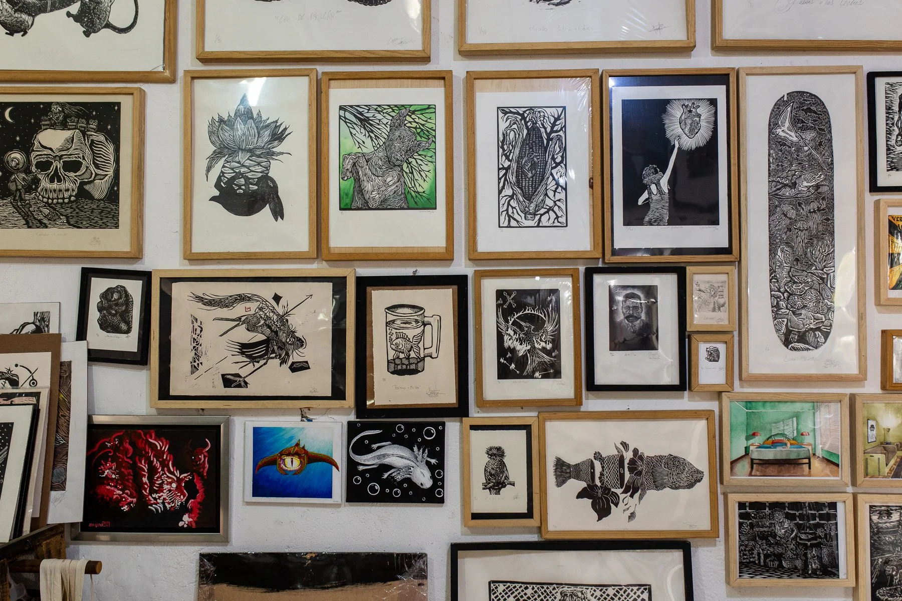 Oaxacan art prints on a wall