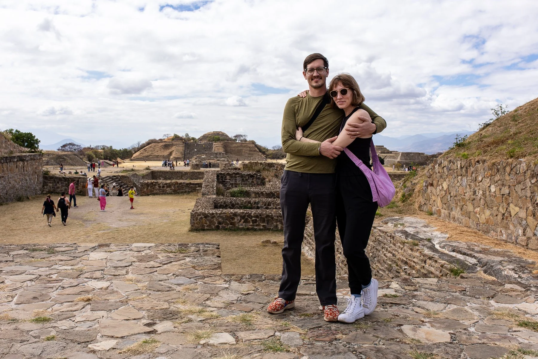 couple posing by Mount Alban