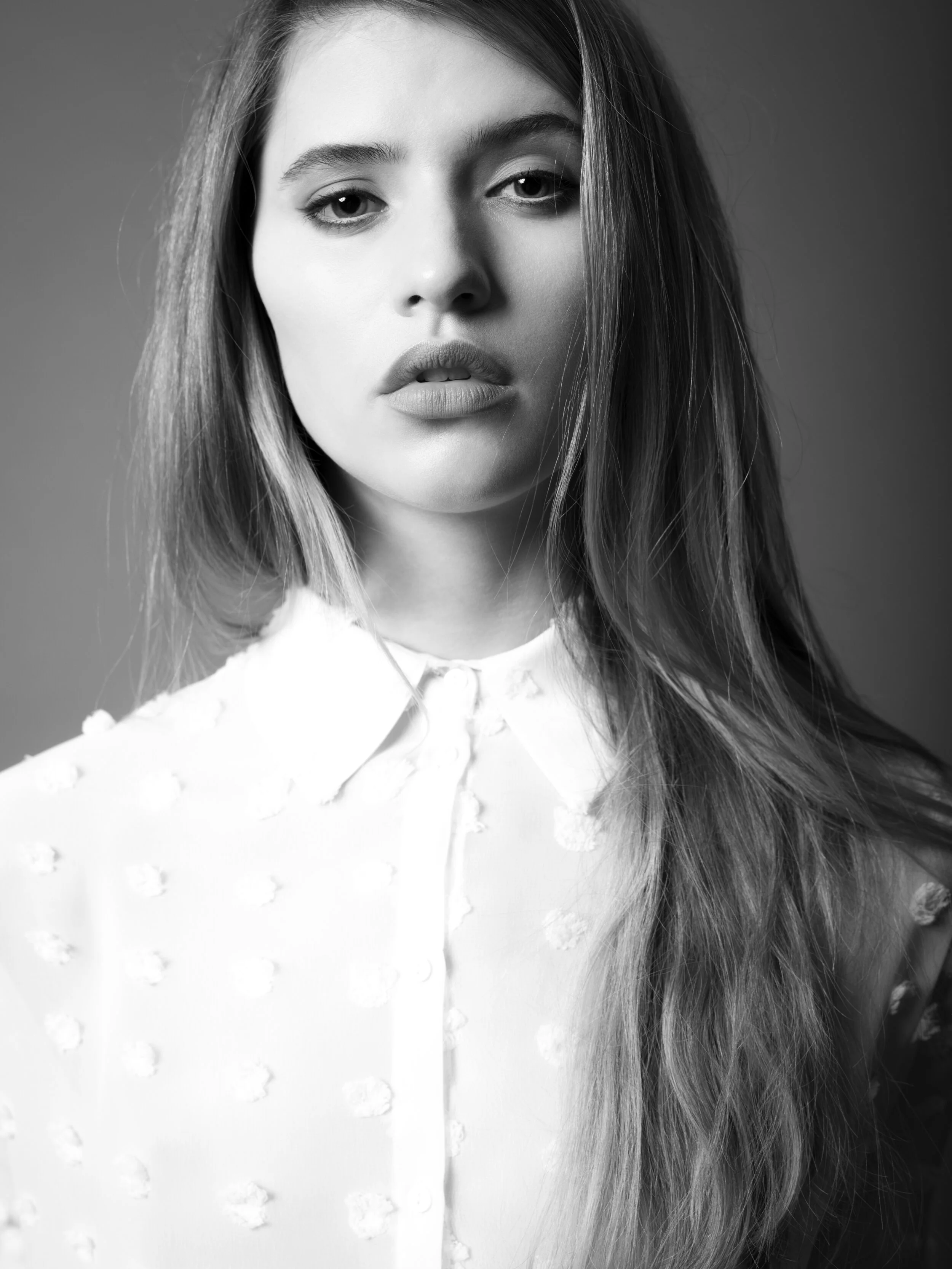  Twin Cities fashion styling featuring close-up of model in white textured button-up shirt 