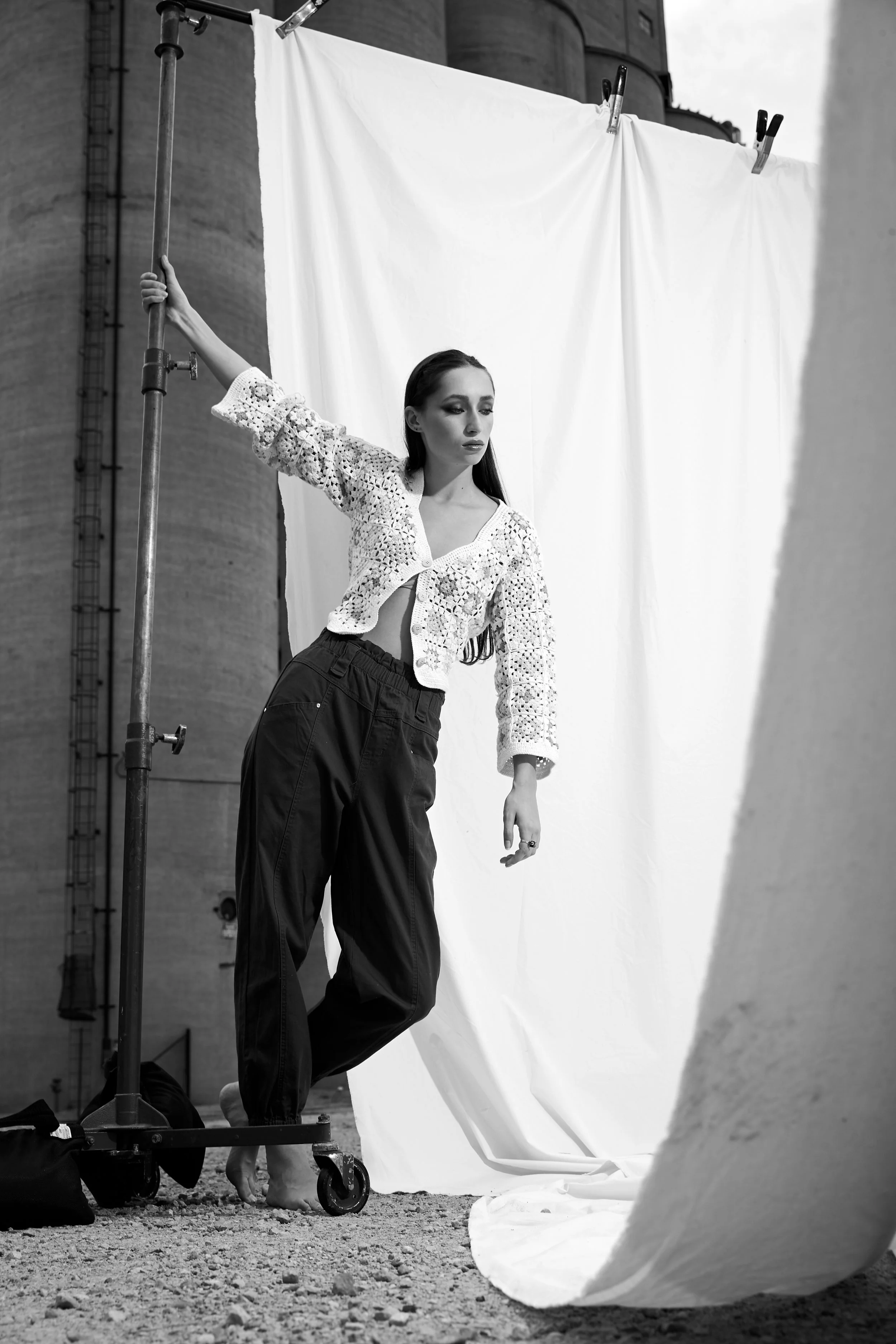  Twin Cities editorial styling featuring black and white photo of model in front of outdoor backdrop 