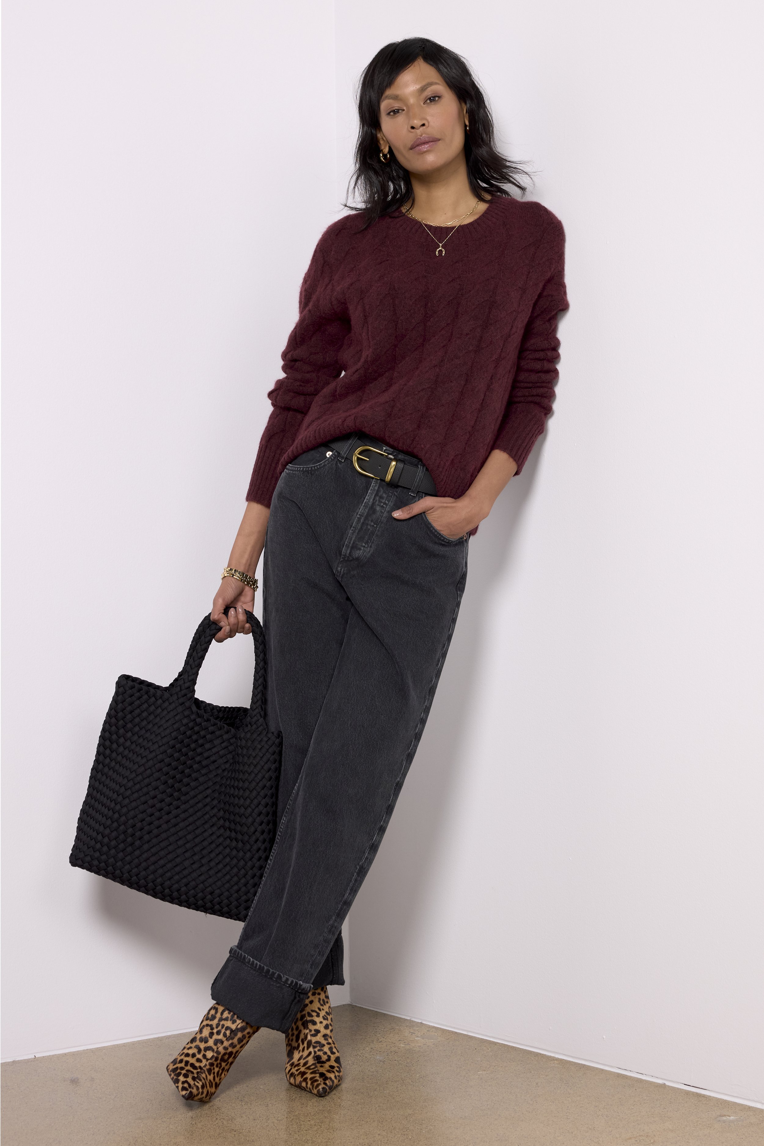  Studio eCommerce styling for Evereve by Minneapolis fashion stylist Kate Moroney featuring sweater, black jeans, and leopard boots 