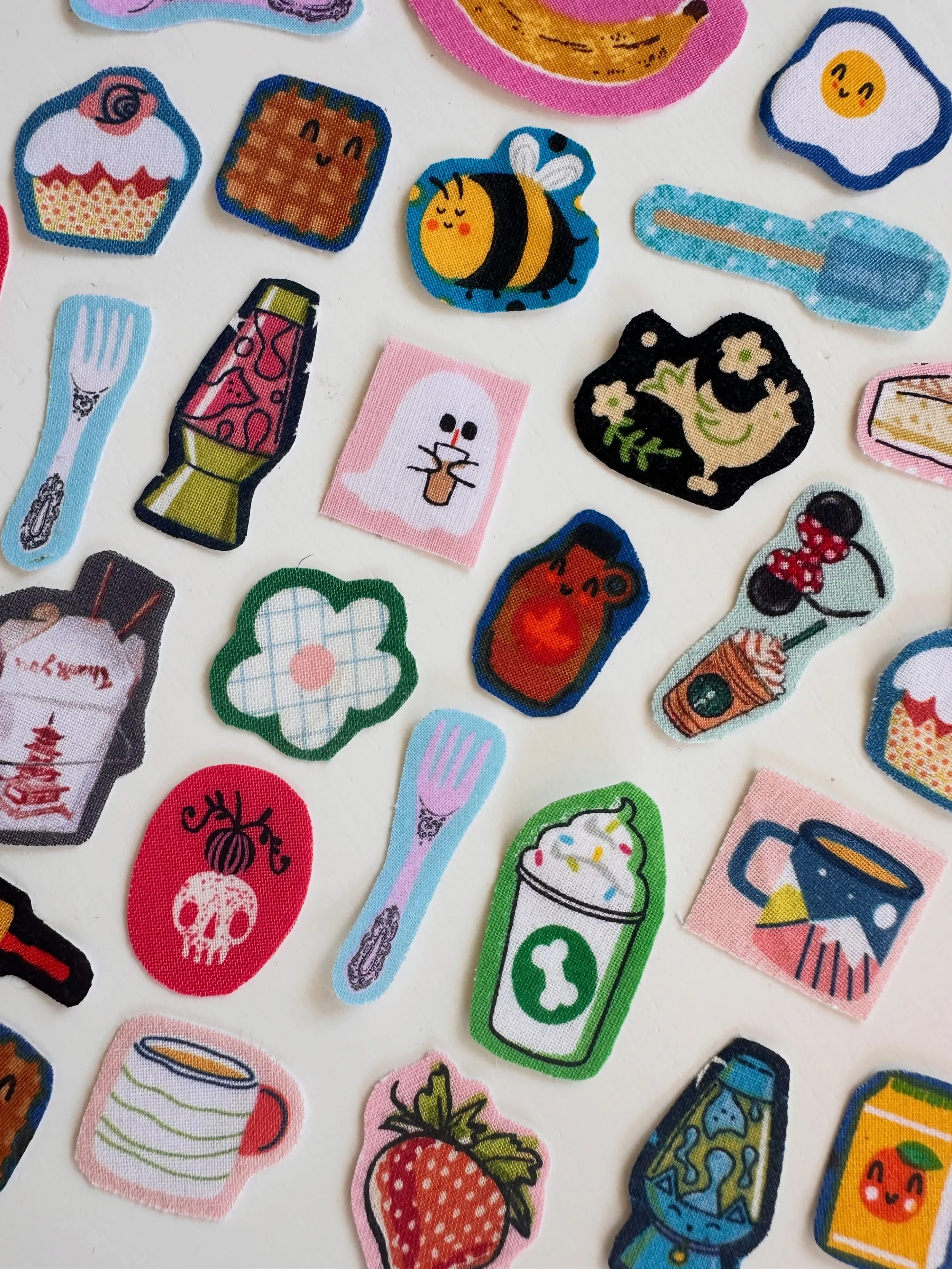 spent some time with my scrap fabric bin last week while the power was out. no idea what to do with all these fabric stickers, but i sure enjoy making them 🤗