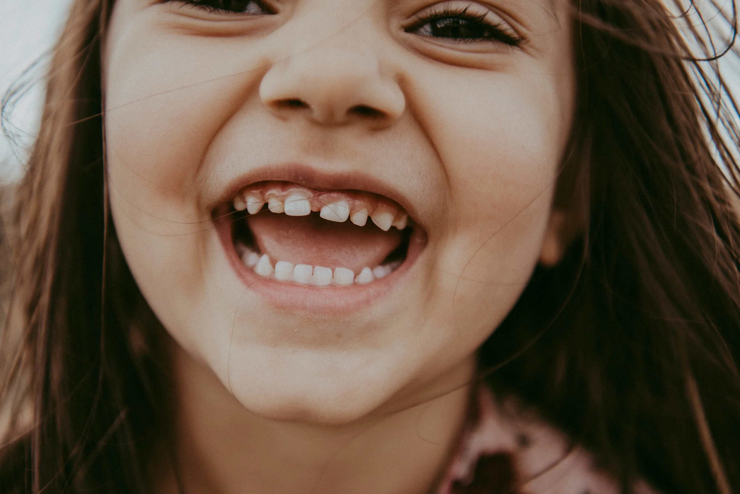 Something about a kids smile before all the teeth are fitting perfectly together makes me so happy.