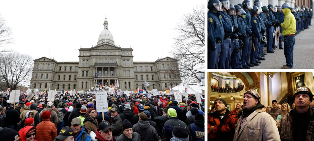 Protesters in and around the state capitol in Lansing on December 11, 2012. "Governor 4 Sale,” read one sign. “Call 1-800-Dick-DeVos.” | AP Photo/Paul Sancya