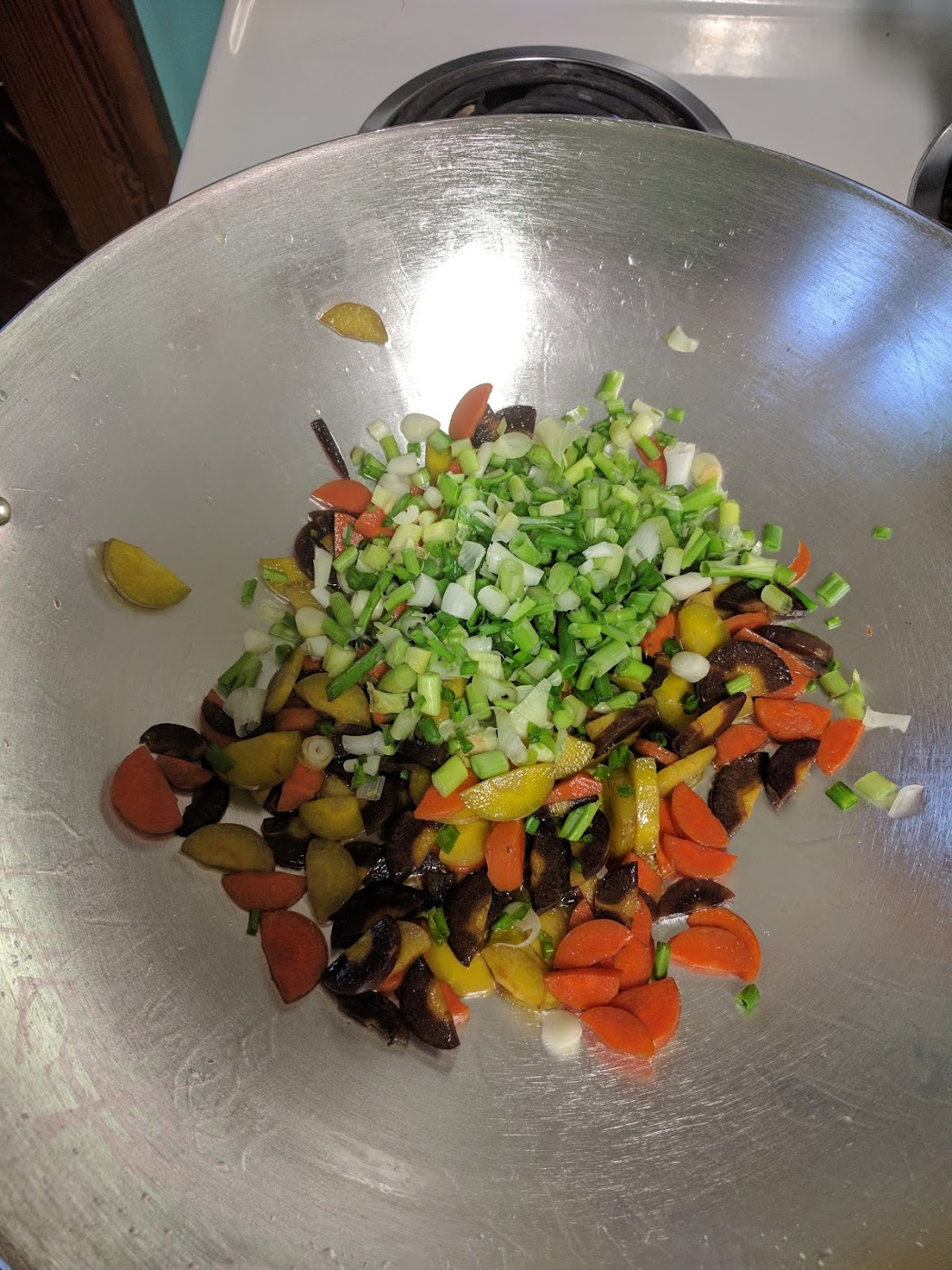 Added green onions (mostly the bottom white part). Stir. 