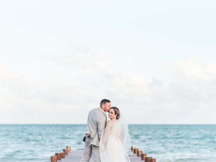 Gorgeous destination wedding photography overlooking the Caribbean Ocean in Cancun Mexico.