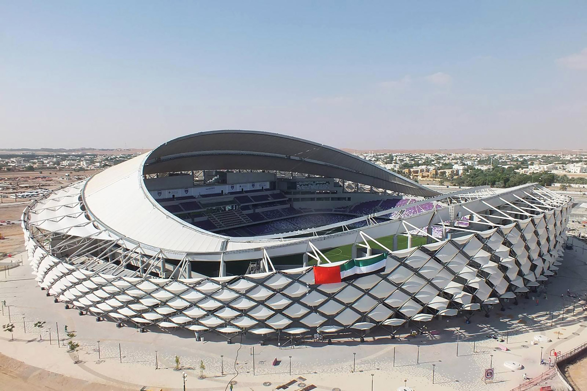 Самые красивые стадионы. Стадион Мохаммед Бин Зайед Стэдиум Абу-Даби. Стадион хазза Бин Зайед. Стадион al Ain Stadium. Мохаммед Бин Зайед, Абу-Даби стадион фото.