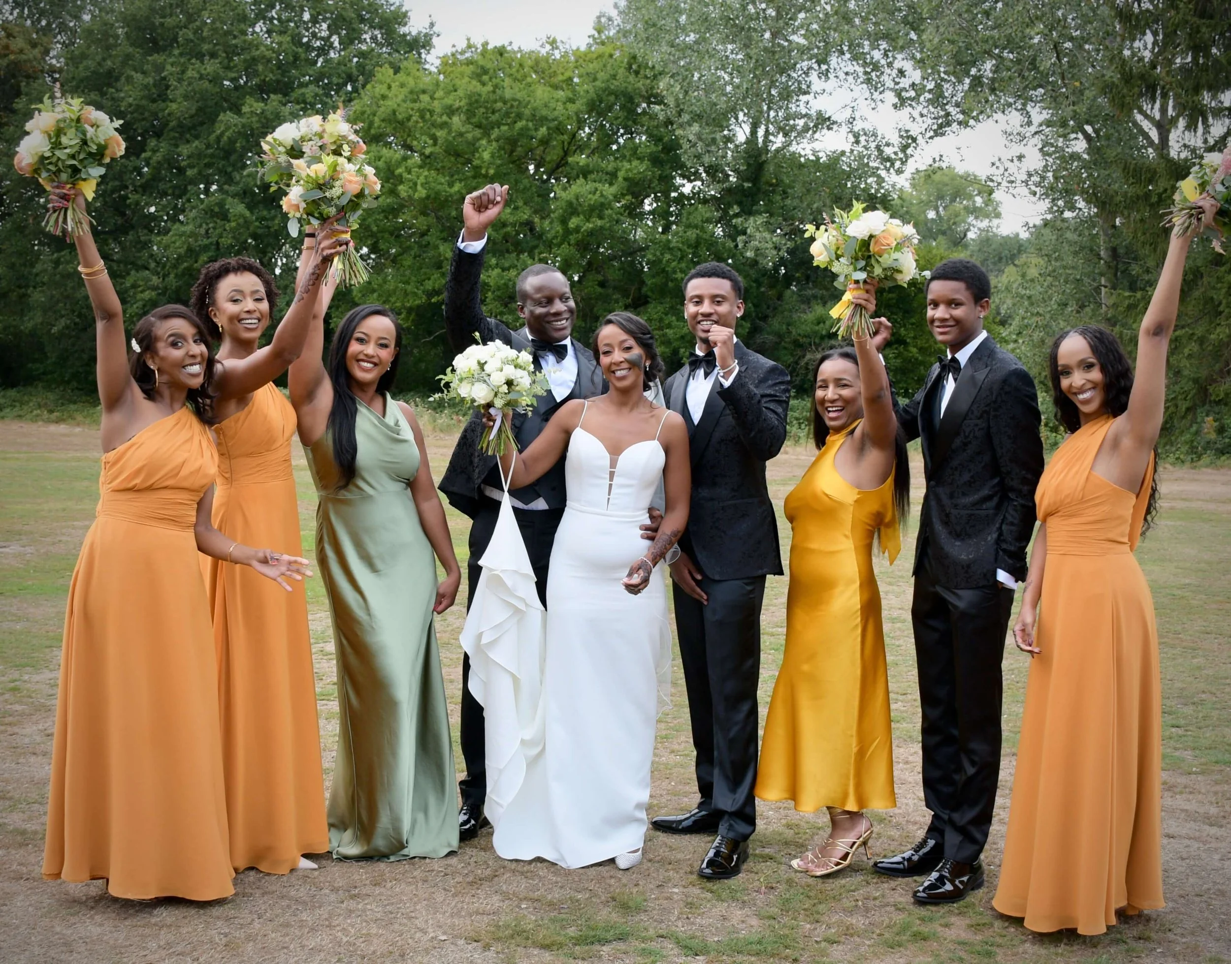 Candid laughter shared between the bride, groom, and wedding party, creating timeless memories filled with love and happiness.