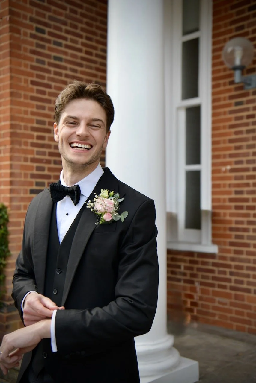Smiling groom ready for the day 