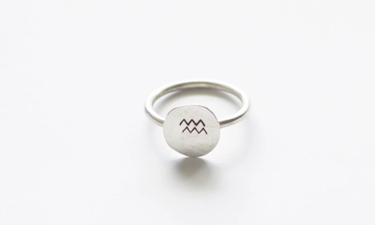 Small stamped mountain ring front.jpg