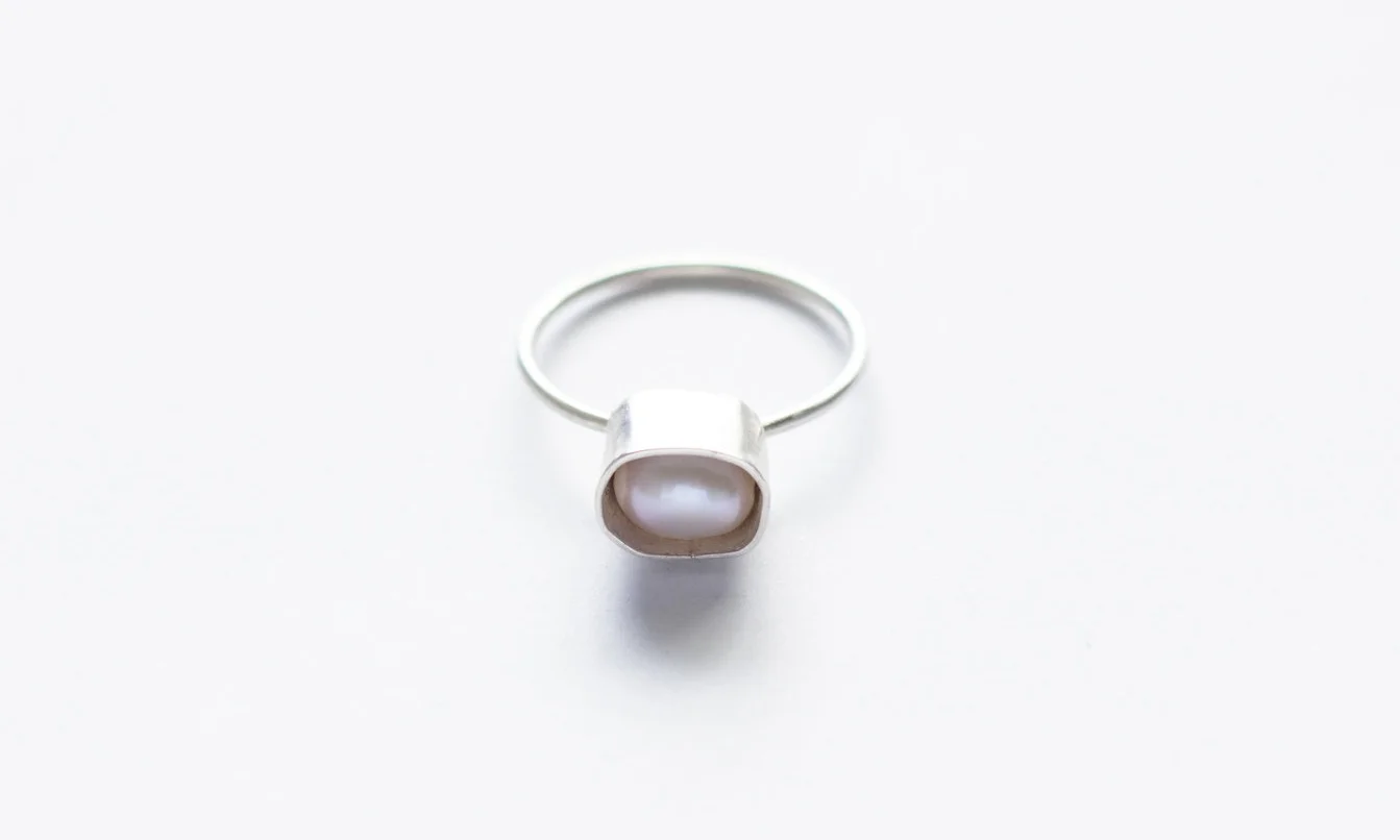 White pearl ring front.jpg
