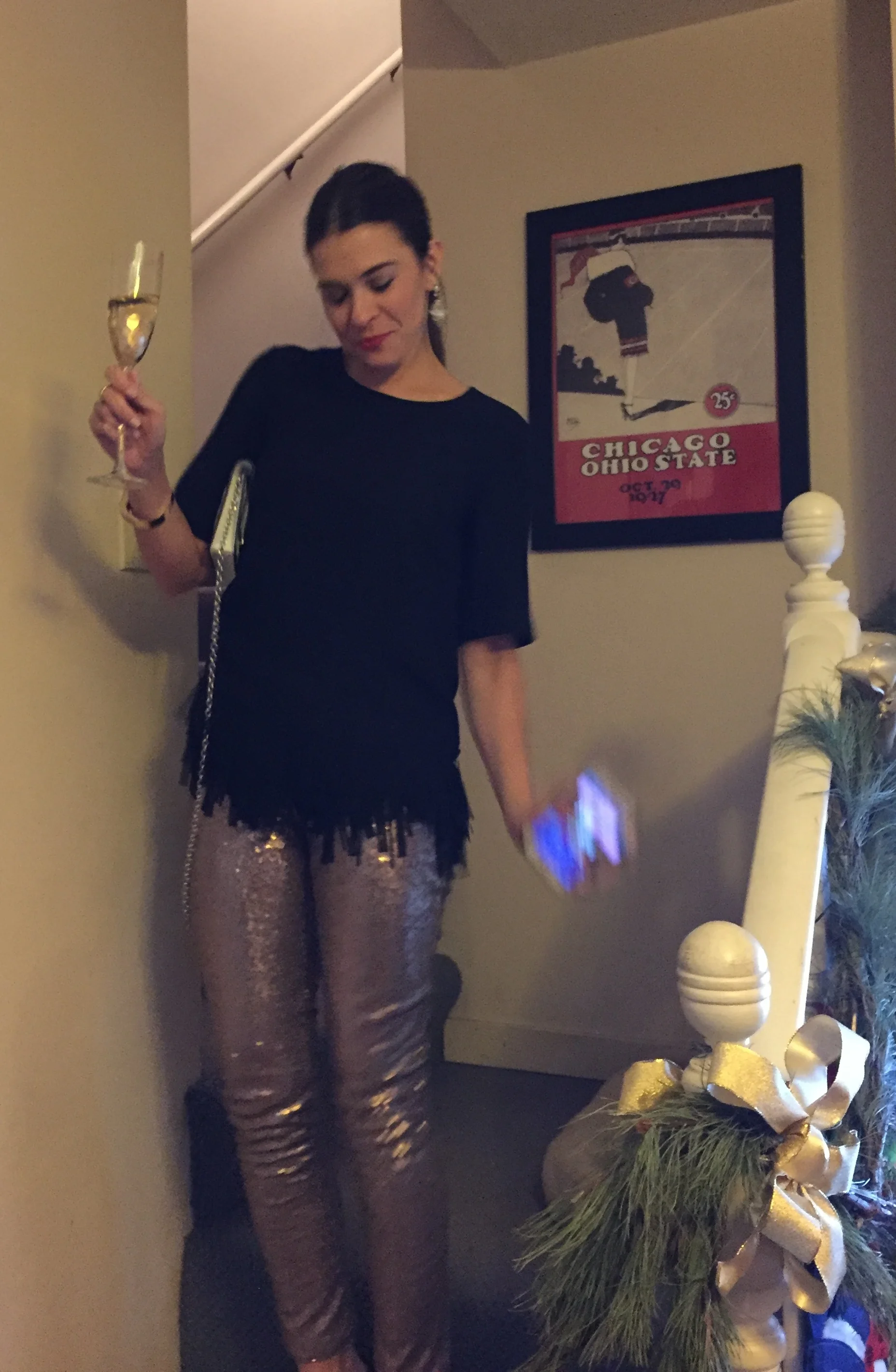 I wish my fiancé was better at taking photos. We're working on it. Pants: Target; Top: Banana Republic; Earrings: Nordstrom; Bag: Henri Bendel