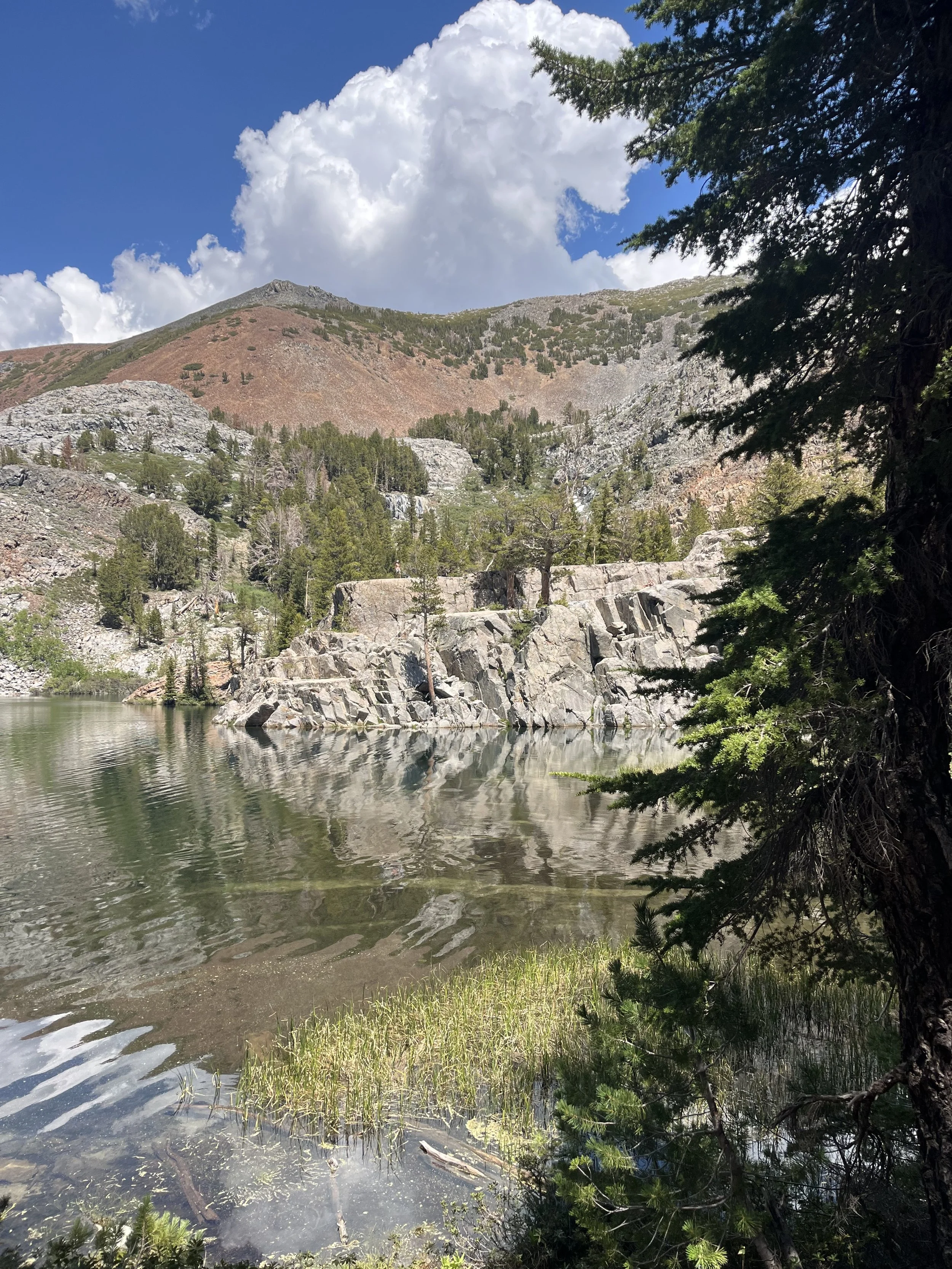 view out to the rock from the lake shore at Arrowhead Lake Mammoth.jpeg