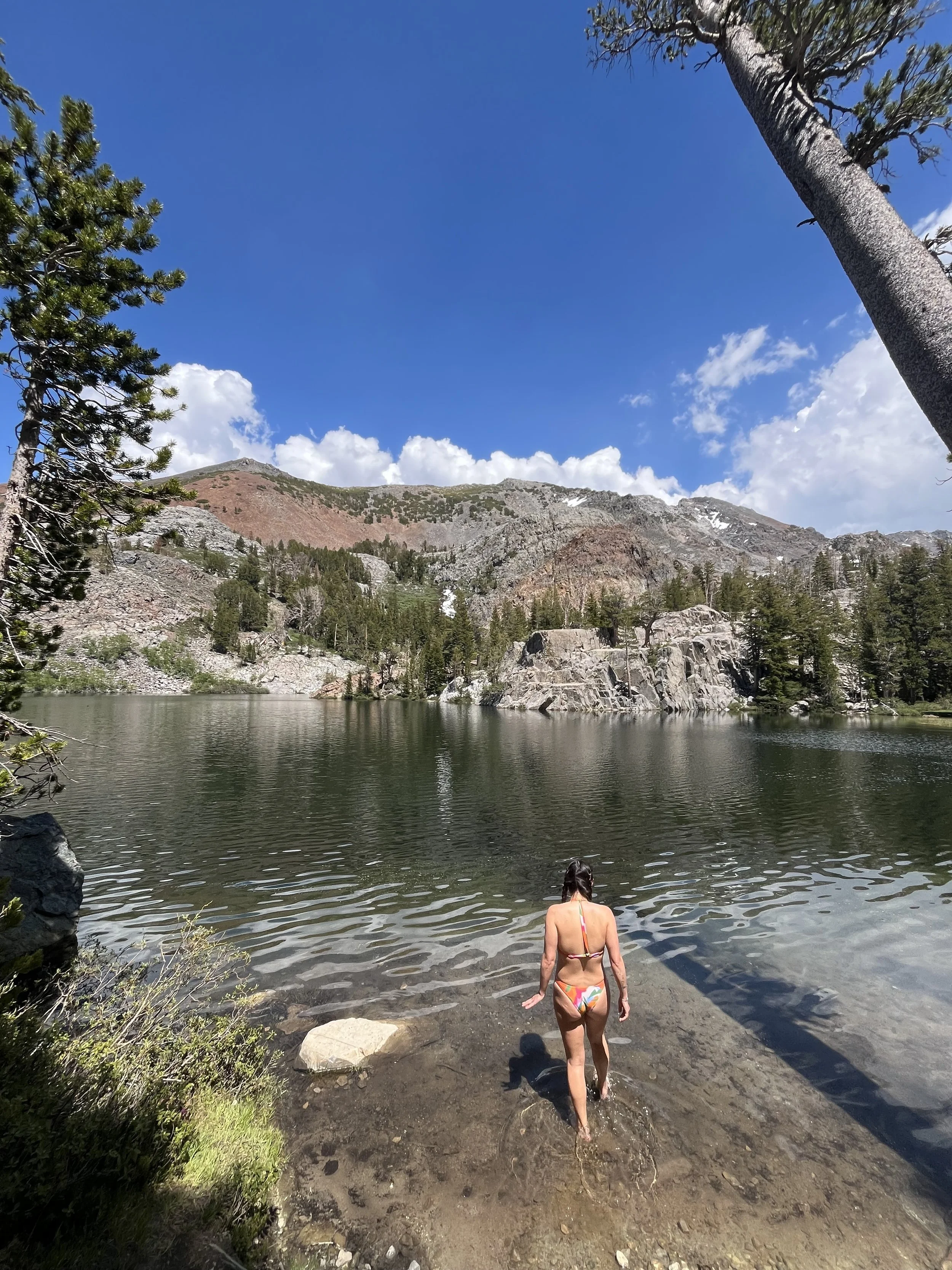 wading into Arrowhead Lake on Duck Pass Trailhead in Mammoth California.jpeg