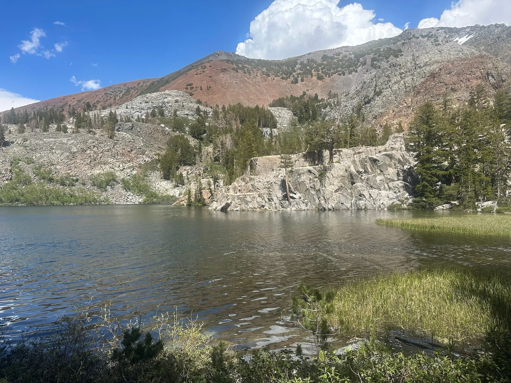 Standing on the Rocks of Mammoth Arrowhead Lake.jpeg