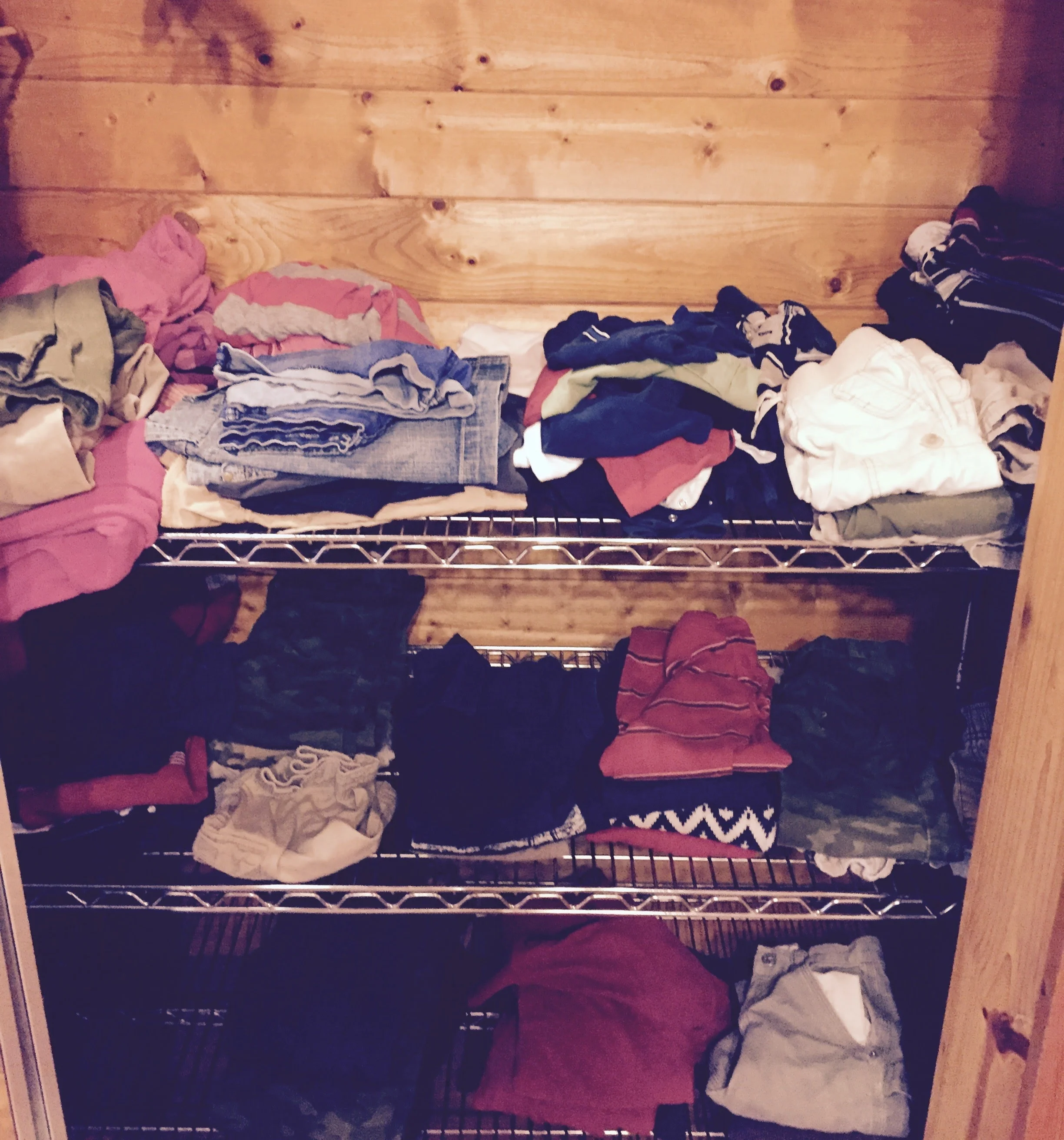 This is not pristine but real life isn't. The children fold their own clothes so I call this a win. This is all 6 children's clothing for summer and winter ages 13 to newborn.