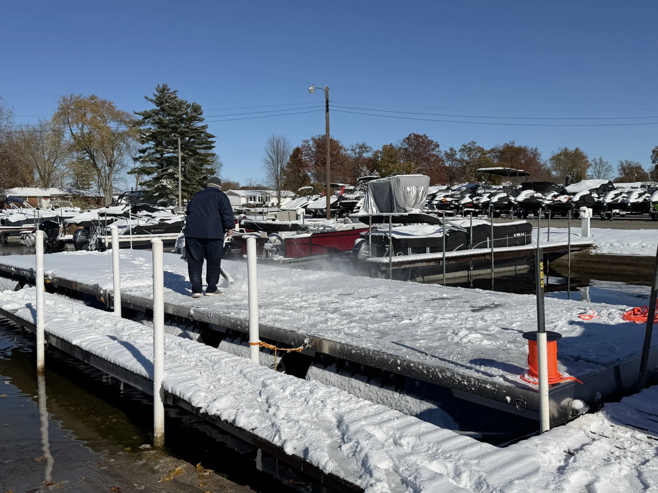 Scott Laughner- WPOA Board Member and Fireworks Committee removing snow