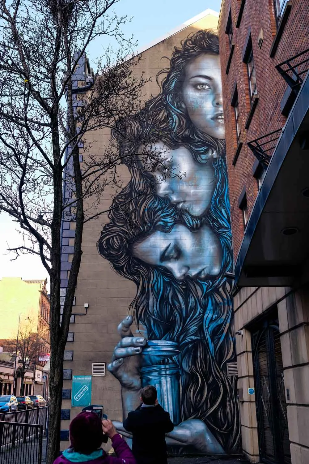 On the side of the Irish News building on Donegall Street