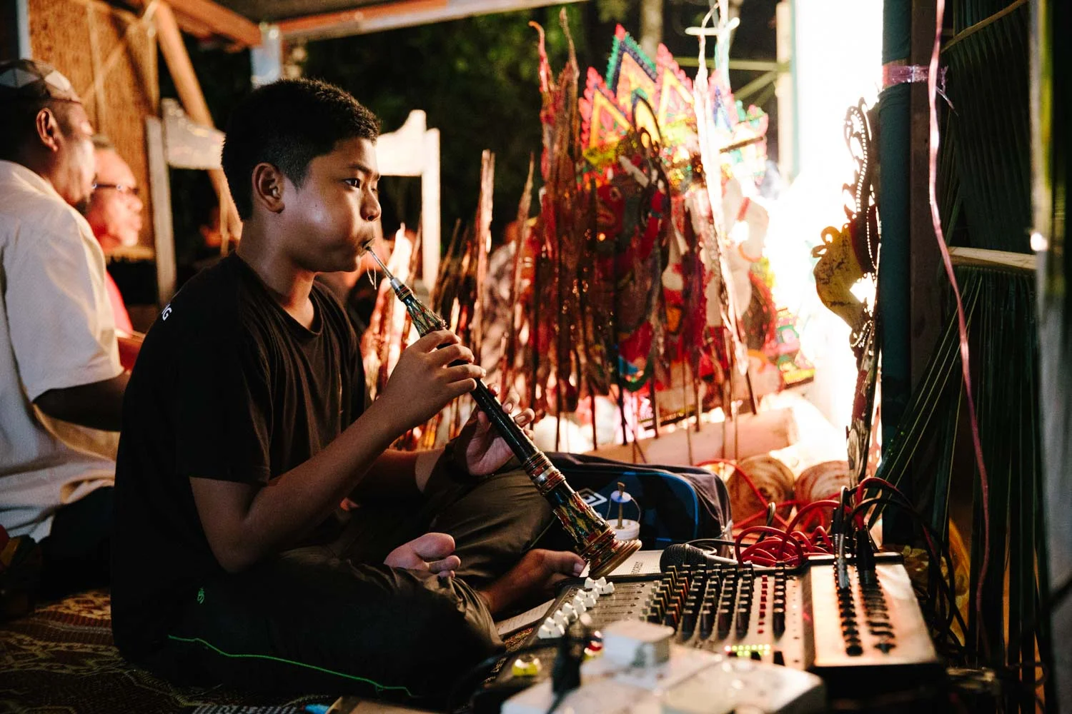 The youngest of the troupe: Abang Man's talented son plays multiple instruments.