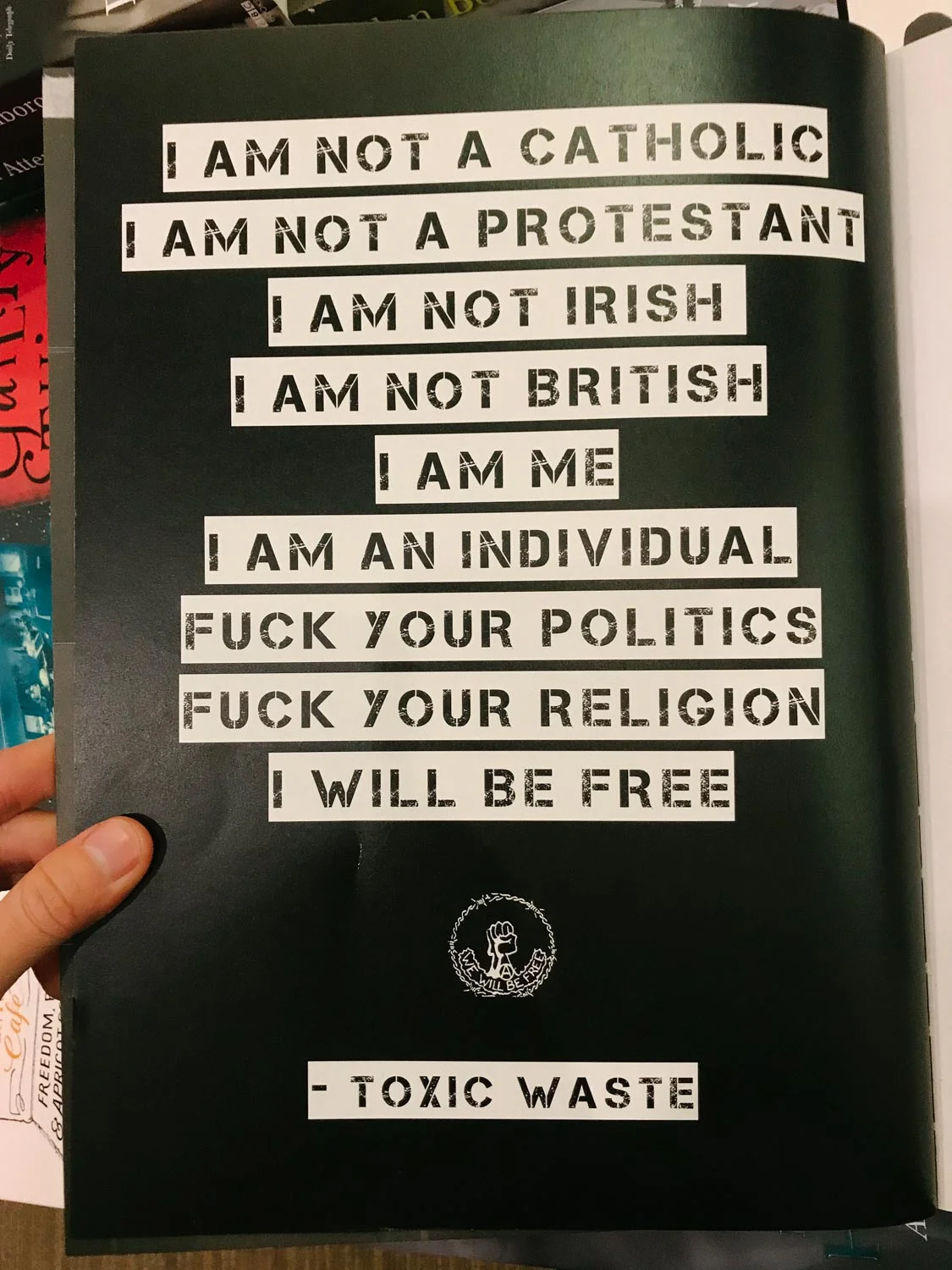 From a photobook titled Belfast Punk: Warzone Centre 1997-2003 , featuring lyrics from a song by Toxic Waste, a Belfast punk band from the 1980s.