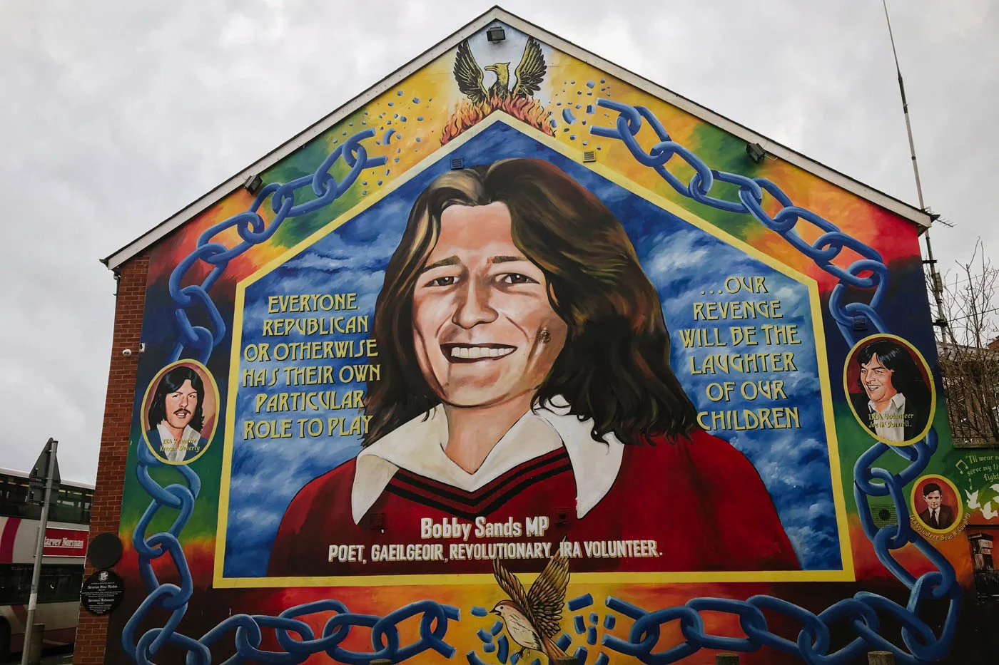On Falls Road, a mural of Bobby Sands, the IRA hunger striker portrayed by Michael Fassbender in Hunger