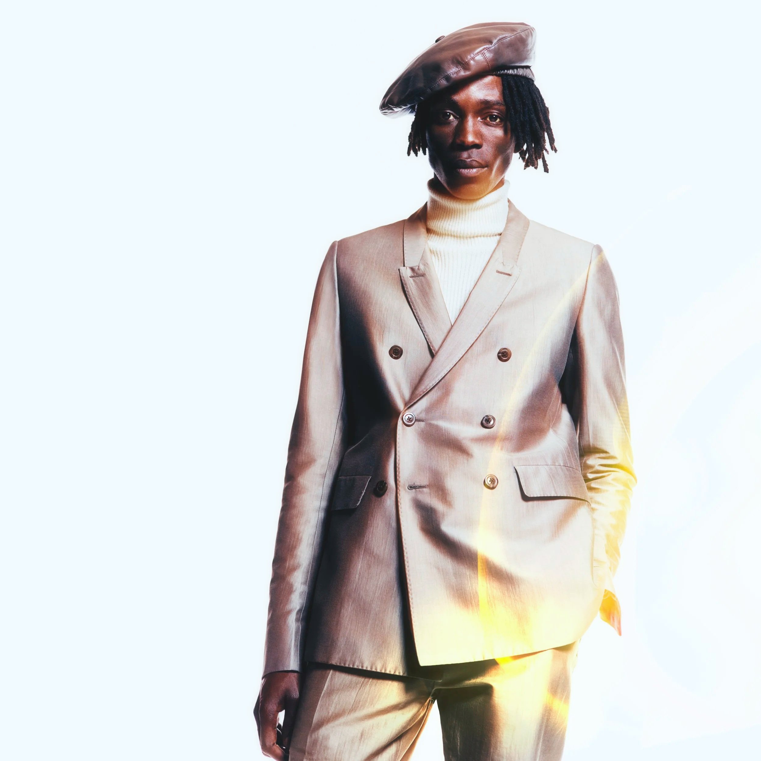 Suit RICK OWENS; hat stylist's archive 