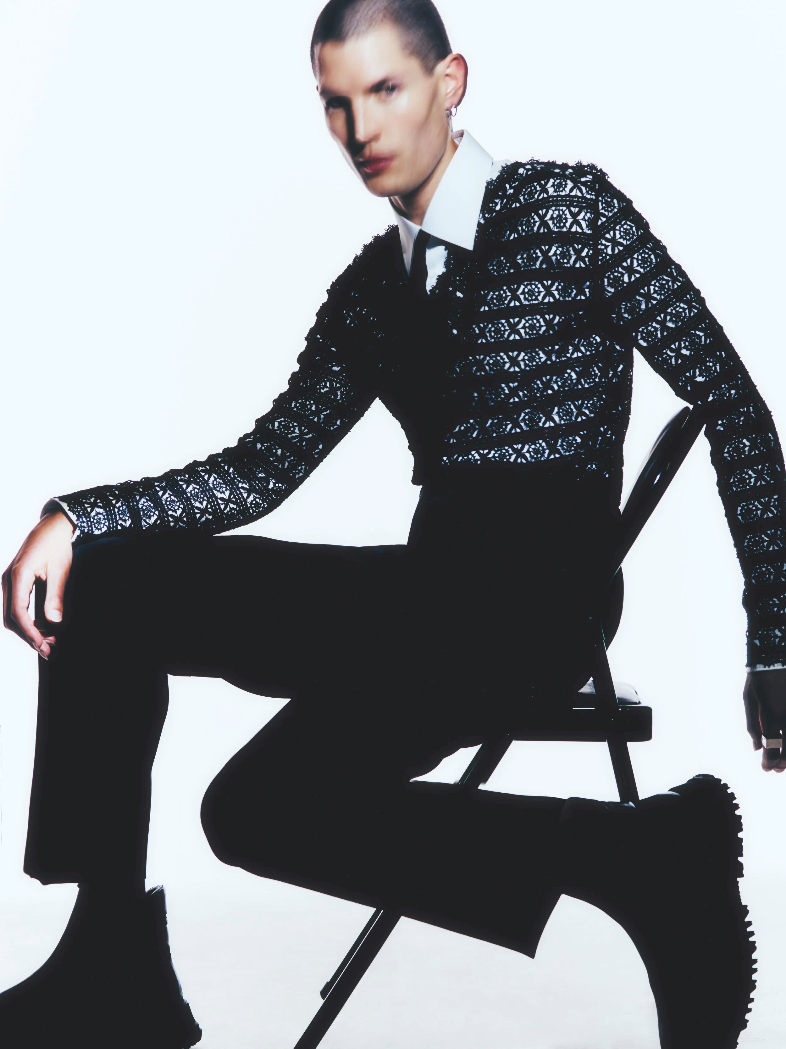 Knitwear GIVENCHY; shirt ALEXANDER MCQUEEN; trousers VERSACE; footwear 1017 ALYX 9SM