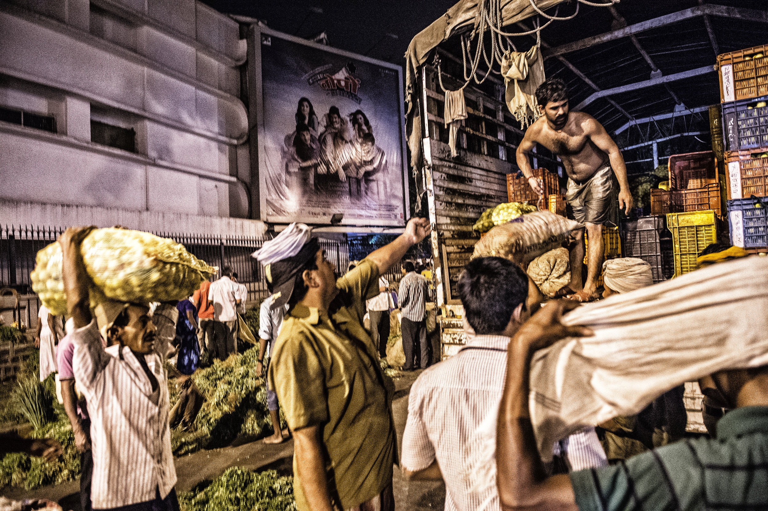 Preparing early in the morning for a market day in Mumbai India for National Geographic