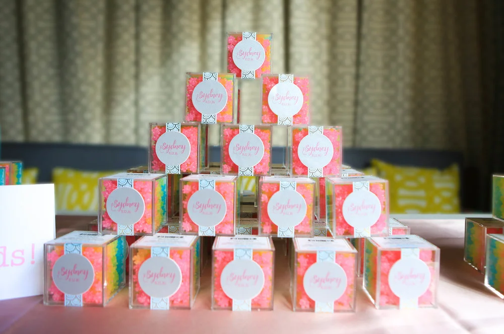 I love the way that www.tablesetgo.com created these Sugarfina-inspired party favors for Sydney’s Bat Mitzvah. You don’t have to have a candy themed celebration to gift these fabulous favors to your guests.