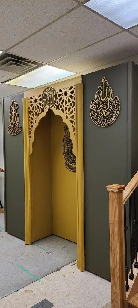 Decorative arch and patterned wall panels