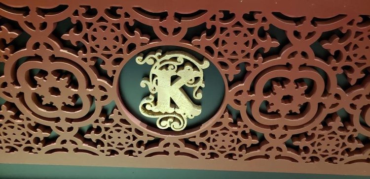 Ornamental panel with a central emblem