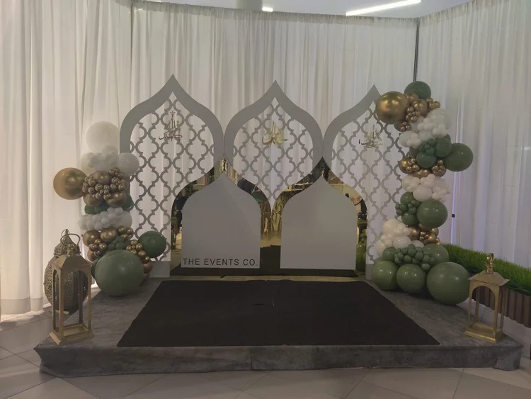 Decorative event backdrop with arched cut panels