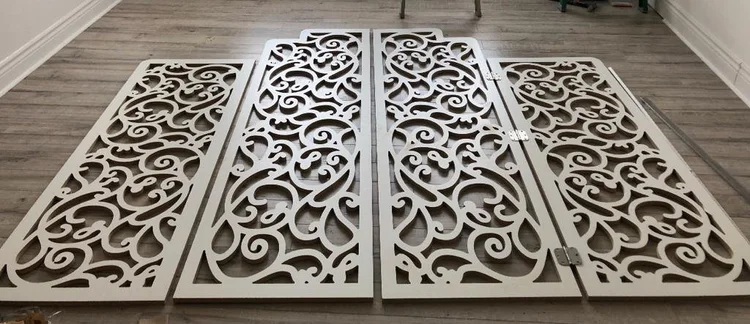 Ornamental cut panels laid out side by side