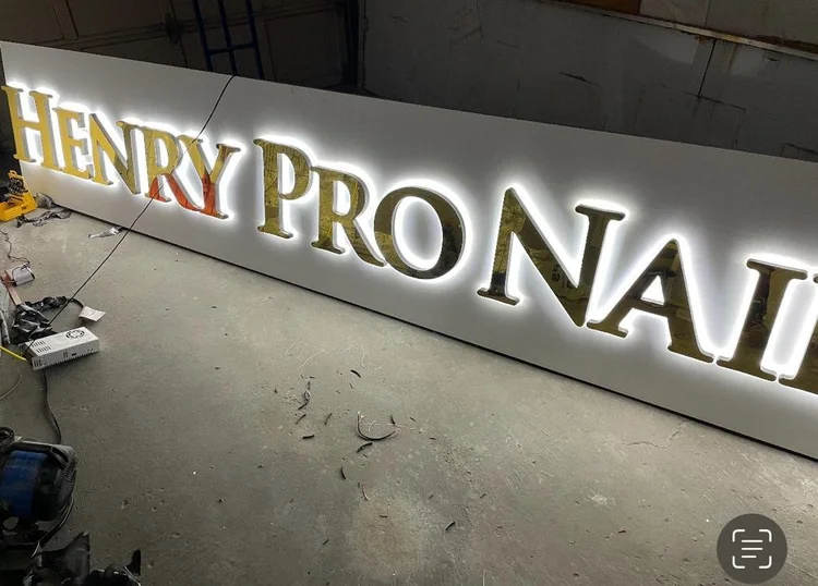 Dimensional storefront lettering on an exterior wall