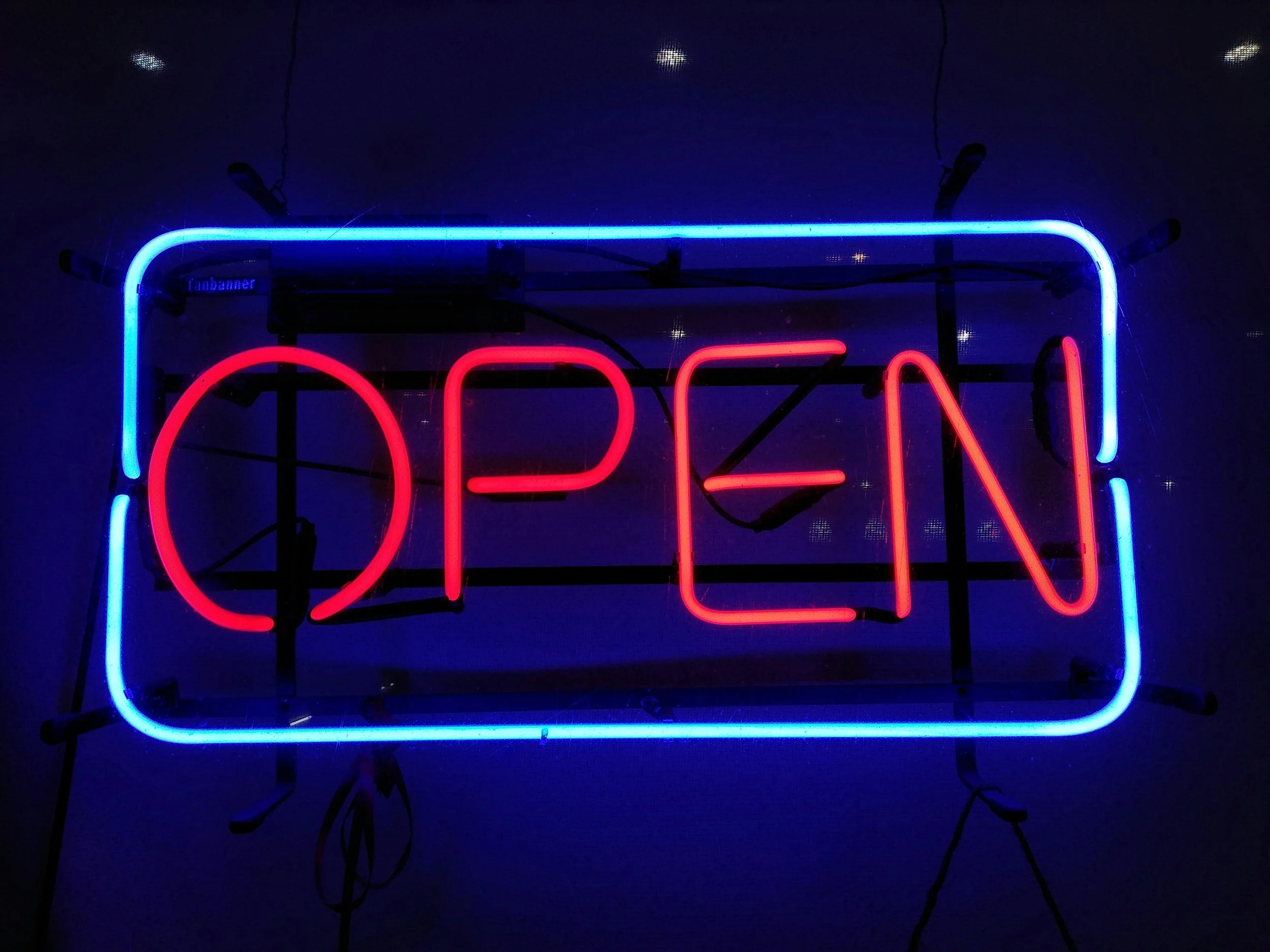 red and blue neon open sign