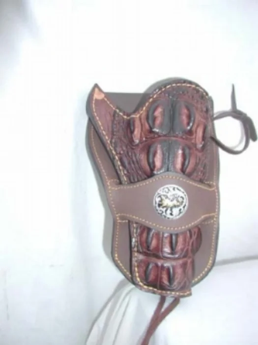 We cover any holster in croc skin, with or without the head. This one does not have the head. Cost of this is $395. With the head (the high quills) is $495