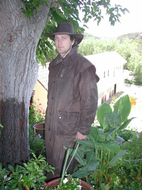 OILSKIN COATS KEEP YOU WARM AND DRY. THEY GO OVER YOUR SADDLE AND TRAP THE HEAT OF THE HORSE. Price: $99