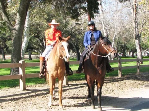 Author Joan Klengler and her husband. Joan worked so hard to overcome her fear of riding she wrote a book about it.