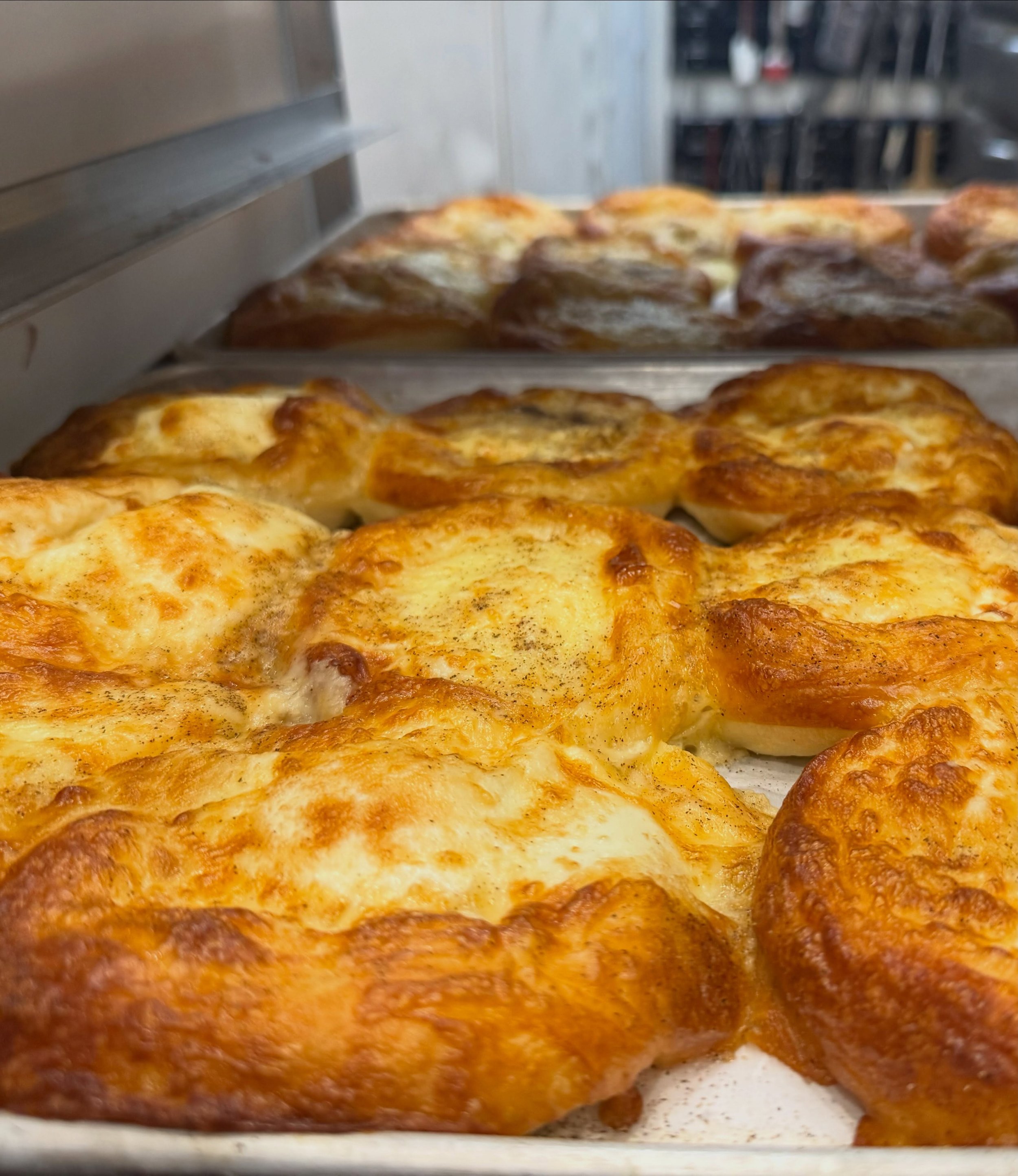 Egg &amp; Cheese Kolaches fresh out of the oven! Grab you one here at Henny Penny or at one of our sister shops; Foxy Loxy Cafe or The Coffee Fox.

#texaskolachesforever #visitsavannah @enjoysavannah #bakerycoffeeshop