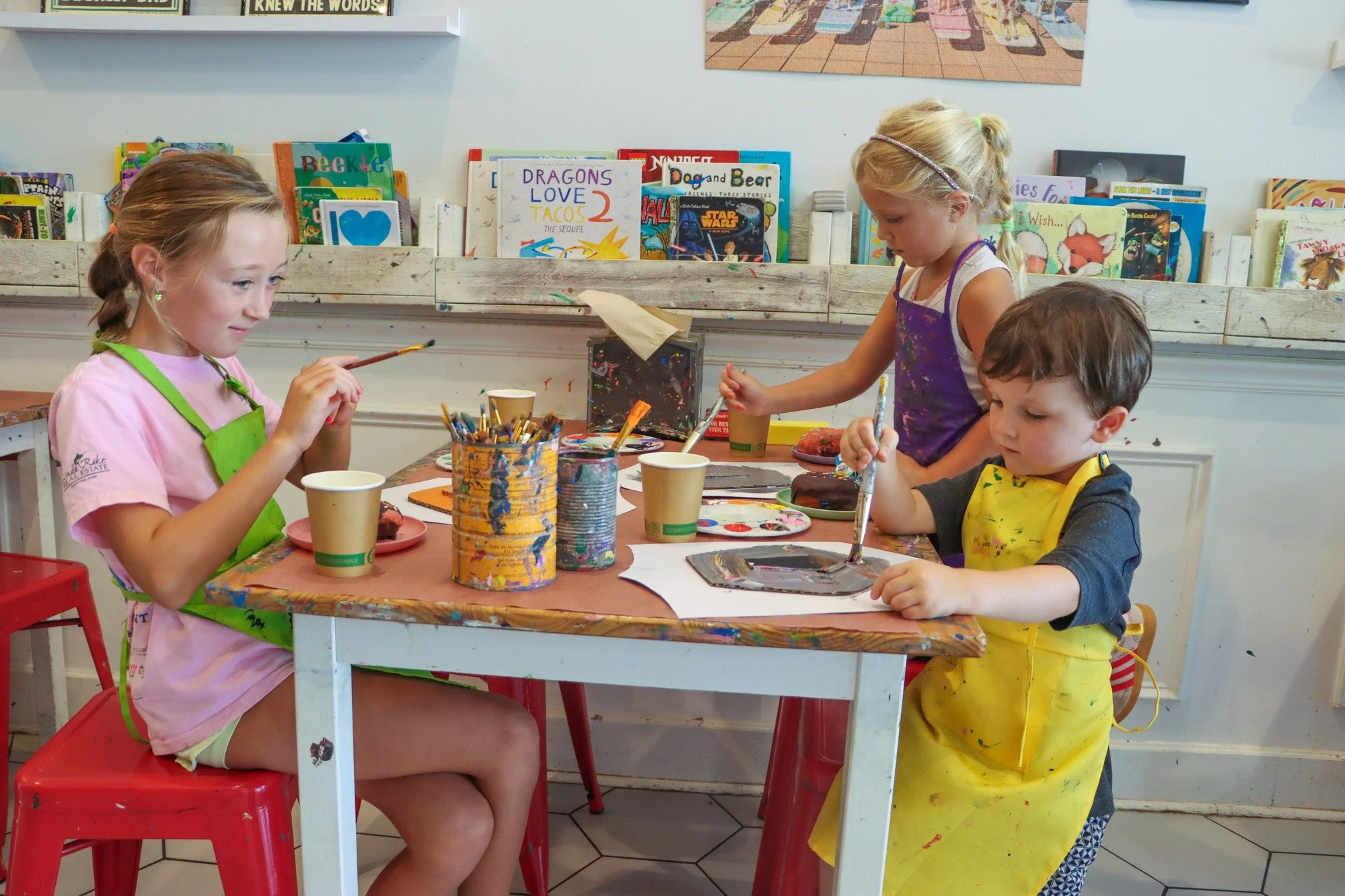 🎉🎨 Make your next birthday celebration a Henny Penny Art Party!
Skip the stress and let us handle the details while your little artist and their friends enjoy a custom arts &amp; crafts project, house-made mini cupcakes, goodie bags, lemonade, and 
