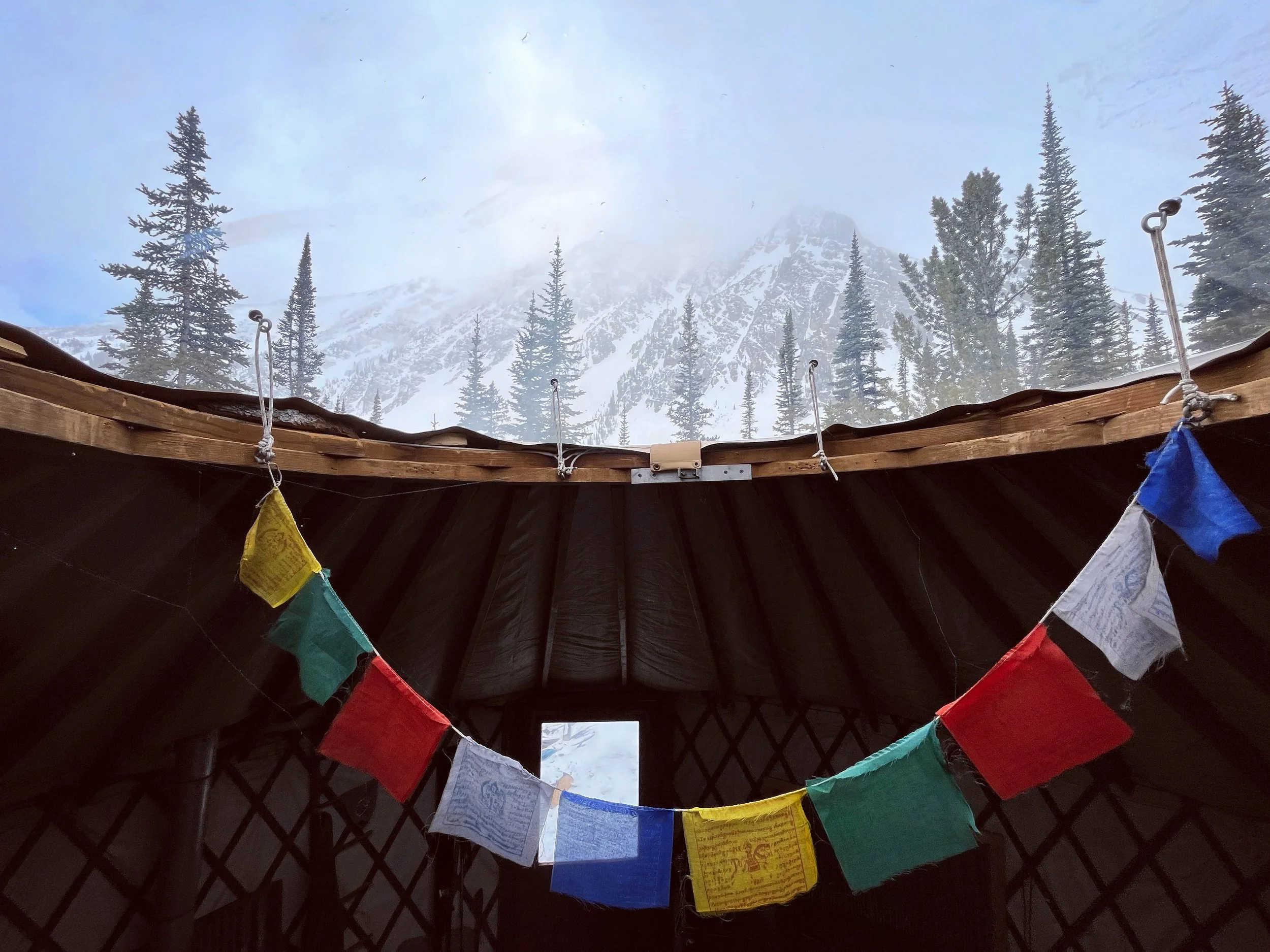 Yurt prayer flags in the mountains