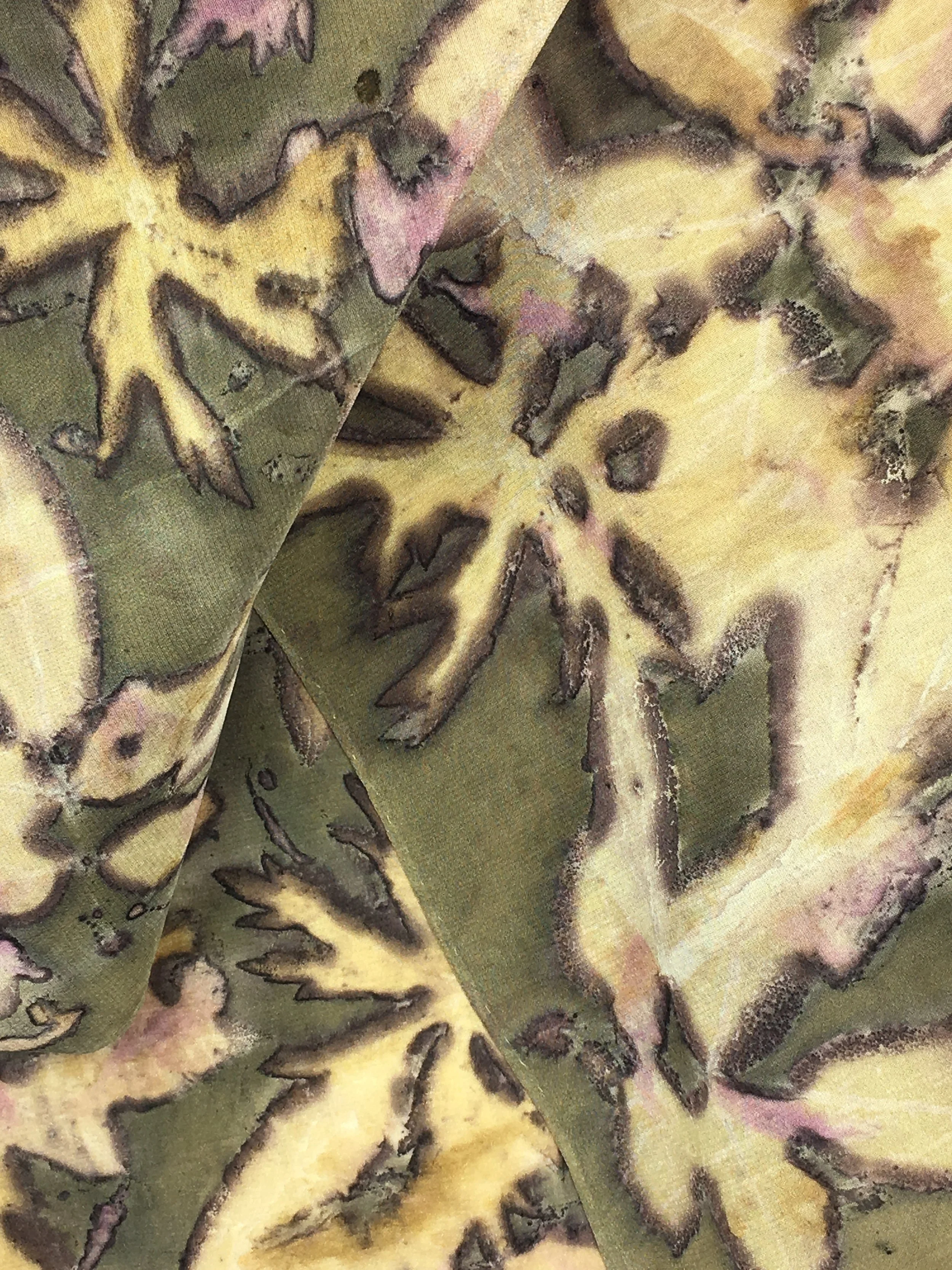  Silk scarf dyed with weld and then printed with Peony, Cranesbill Geranium, and Rose leaves, along with Peony petals.&nbsp; 