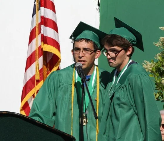 A very young us, delivering a speech at our high school graduation in 2011.