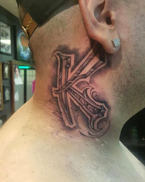 Custom lettering, barbershop blades side of the neck black and gray. 