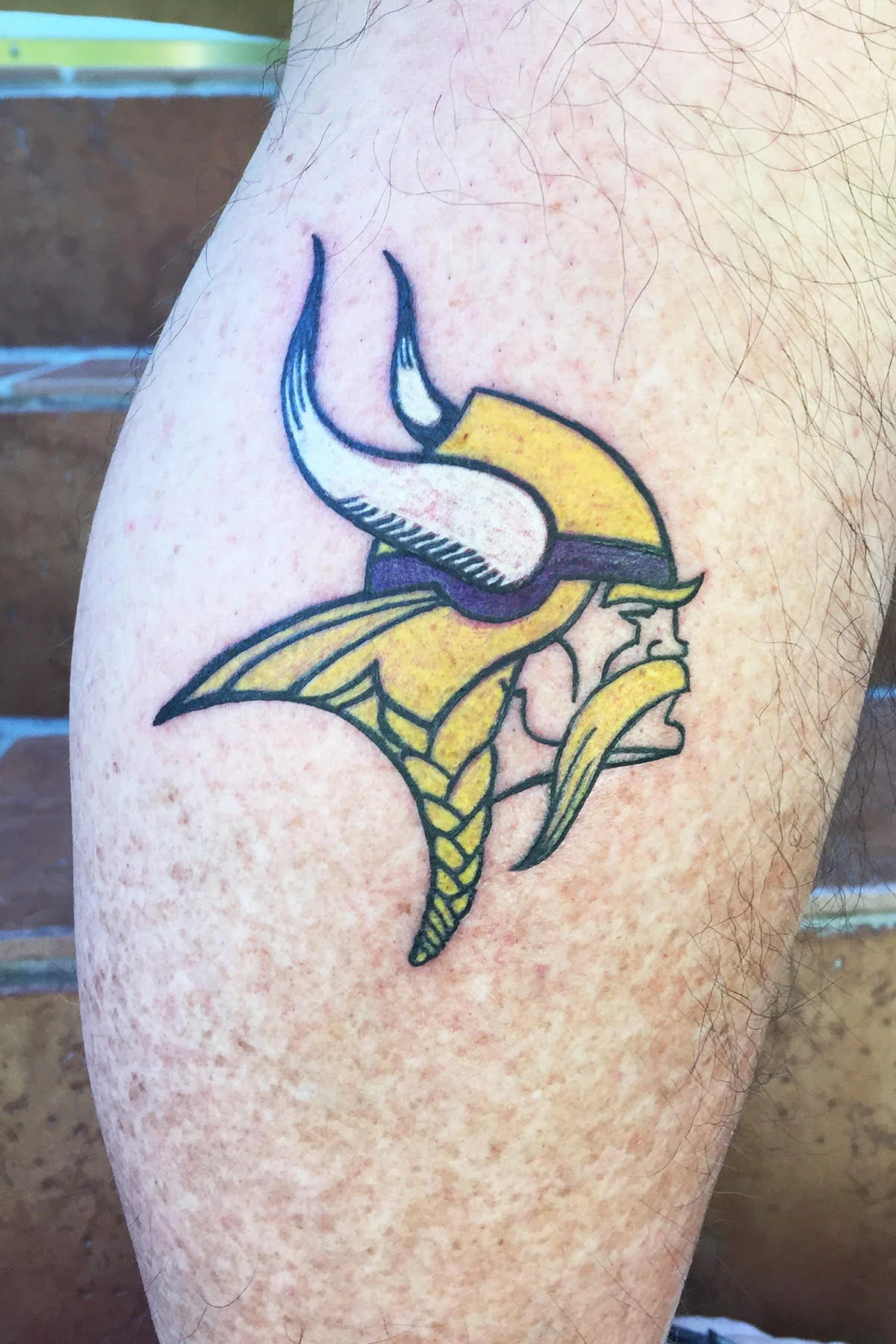 Vikings NFL Logo sports teams. Side leg calf full color tattoo. 