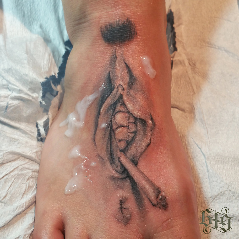 Genghis vagina with teeth on a foot smoking a joint black and white — GOLD  STRIPE TATTOO