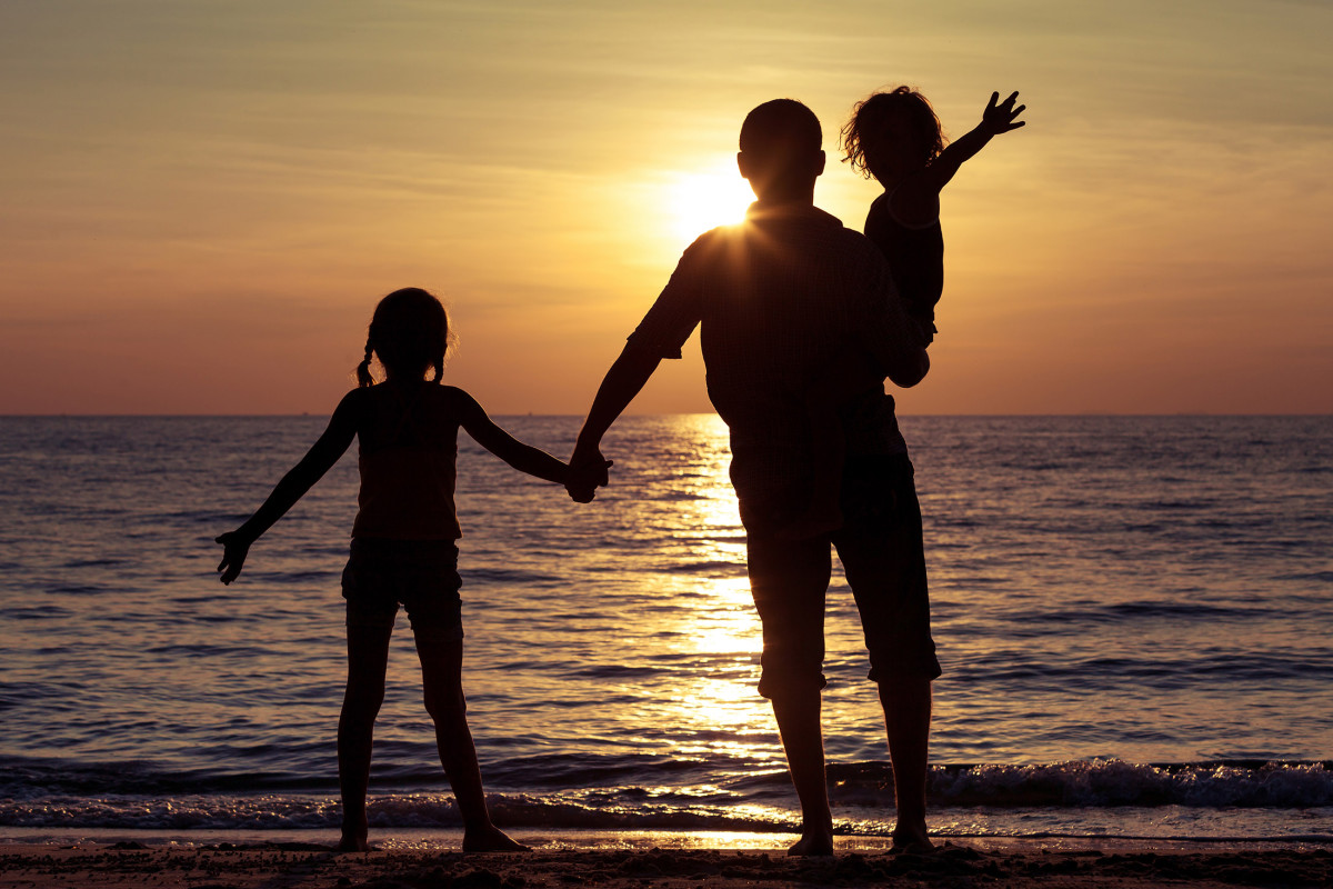 dad and kids at the beach.jpg